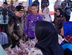 PJ.Bupati Marindo kurniawan Buka  Gerakan Pangan Murah di Gading Rejo