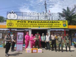 Berikan Dukungan Moral ,Bhayangkara Berikan Tali Asih Kepada Personel Pospam Nataru di Bandar Lampung.