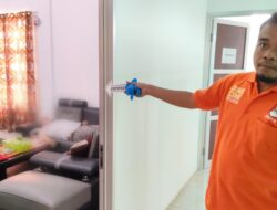 Inafis Sat Reskrim Polres Tanggamus Olah TKP Temuan Mayat di Kantor DPMTSP